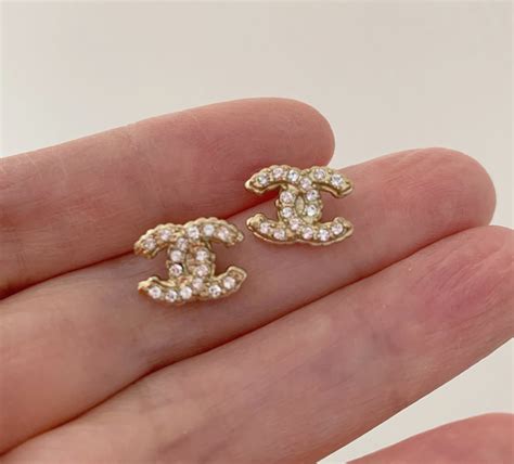 chanel gold logo studs|chanel cc earrings price list.